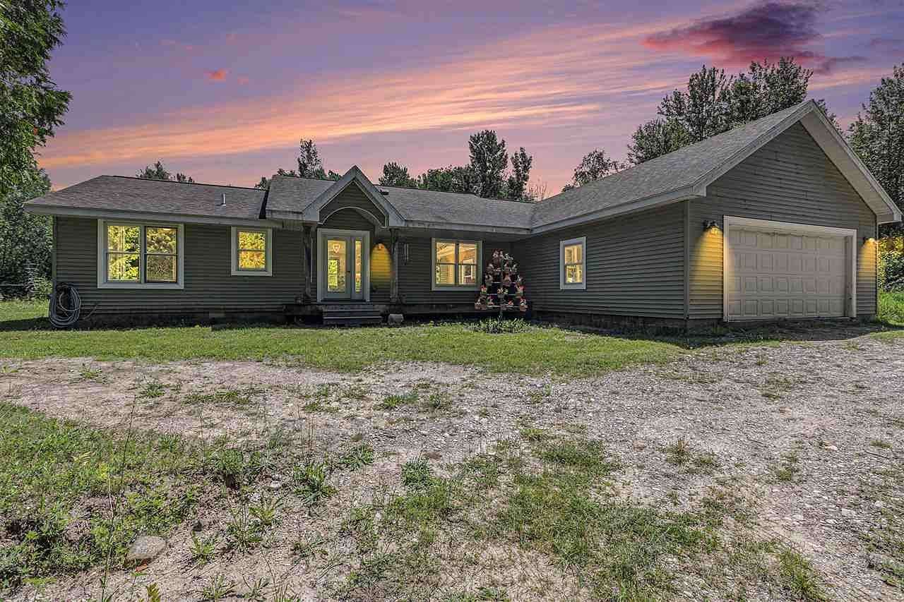 6.4 Acres of Land with Home for Sale in Charlevoix, Michigan