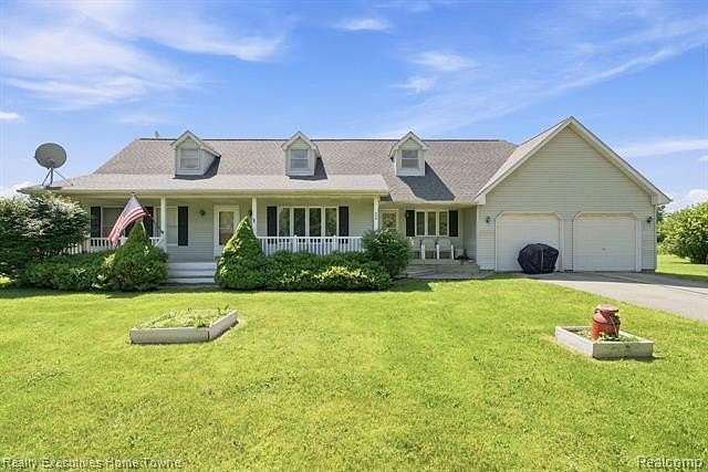 6 Acres of Land with Home for Sale in Riley Township, Michigan