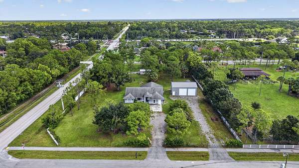 2.54 Acres of Land with Home for Sale in Loxahatchee Groves, Florida