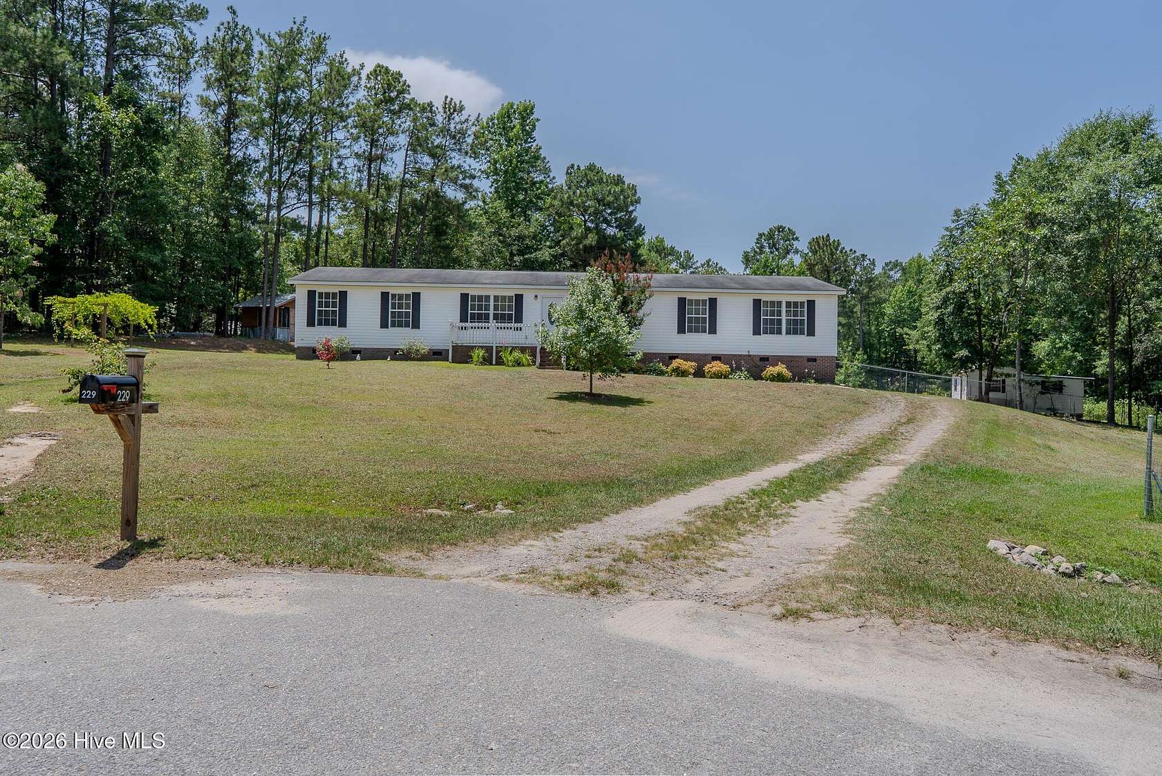 3.26 Acres of Land with Home for Sale in Cameron, North Carolina