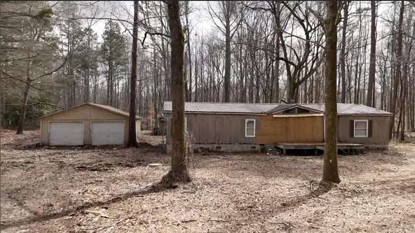 5.13 Acres of Land with Home for Sale in Cumming, Georgia