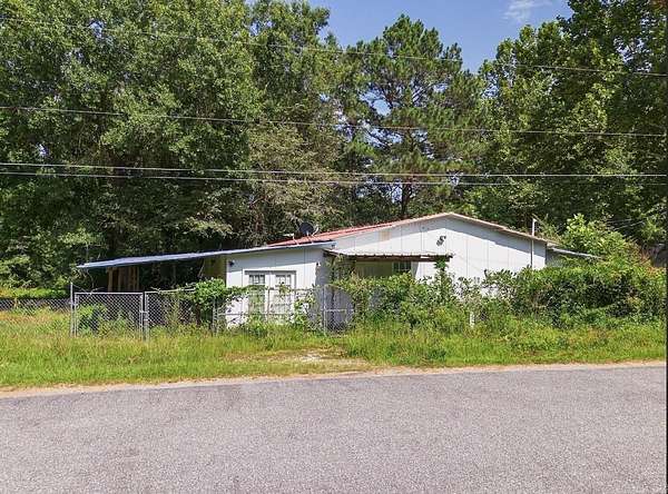 4.48 Acres of Land with Home for Sale in Sheridan, Arkansas