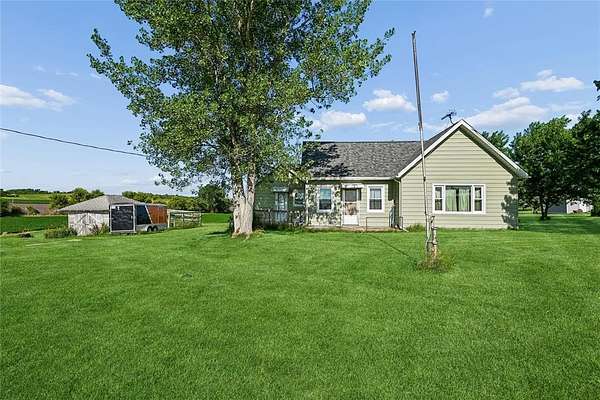 7.23 Acres of Land with Home for Sale in Belle Plaine, Iowa