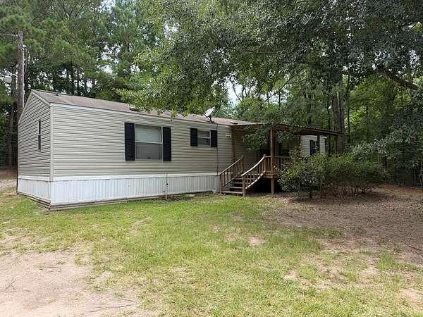 2.79 Acres of Land with Home for Sale in San Augustine, Texas