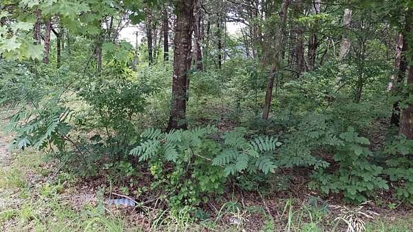 0.09 Acres of Residential Land for Sale in Merriam Woods, Missouri