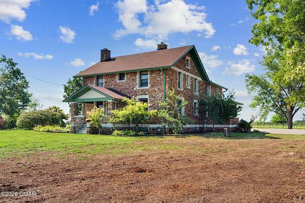 8.59 Acres of Land with Home for Sale in Carthage, Missouri