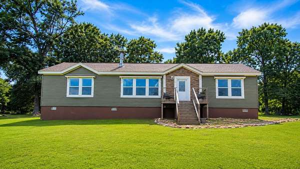 12.1 Acres of Land with Home for Sale in Alton, Missouri