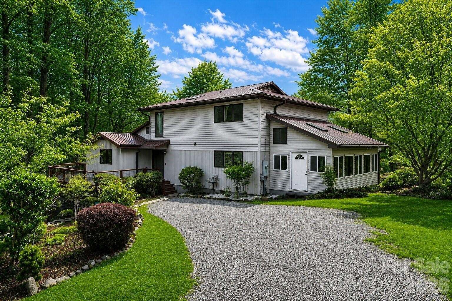 4.76 Acres of Land with Home for Sale in Hendersonville, North Carolina