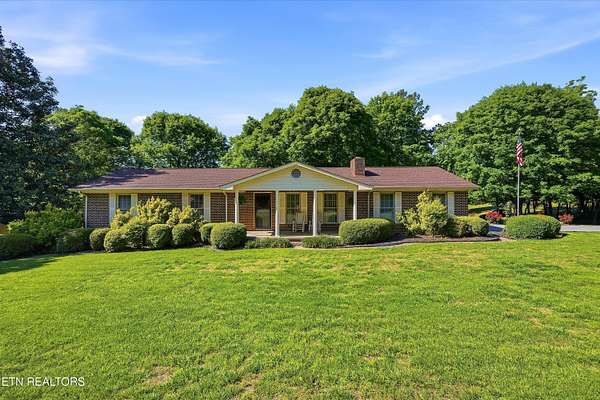 138 Acres of Recreational Land with Home for Auction in Riceville, Tennessee