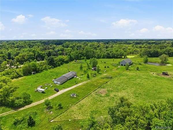 4.12 Acres of Land with Home for Sale in Gaines Township, Michigan