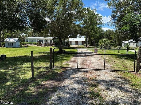 2.78 Acres of Land with Home for Sale in Fort Denaud, Florida