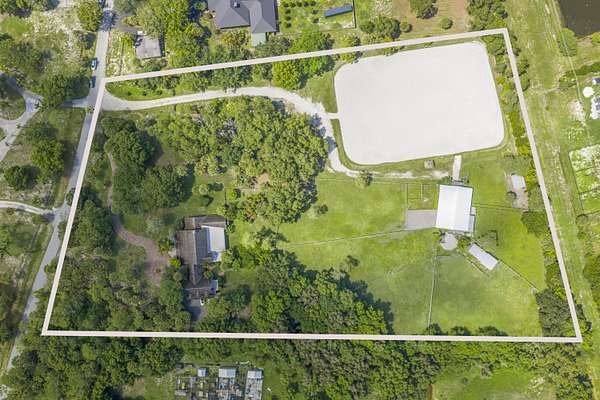 6.19 Acres of Land with Home for Sale in Wellington, Florida