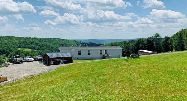 25 Acres of Land with Home for Sale in Smyrna, New York