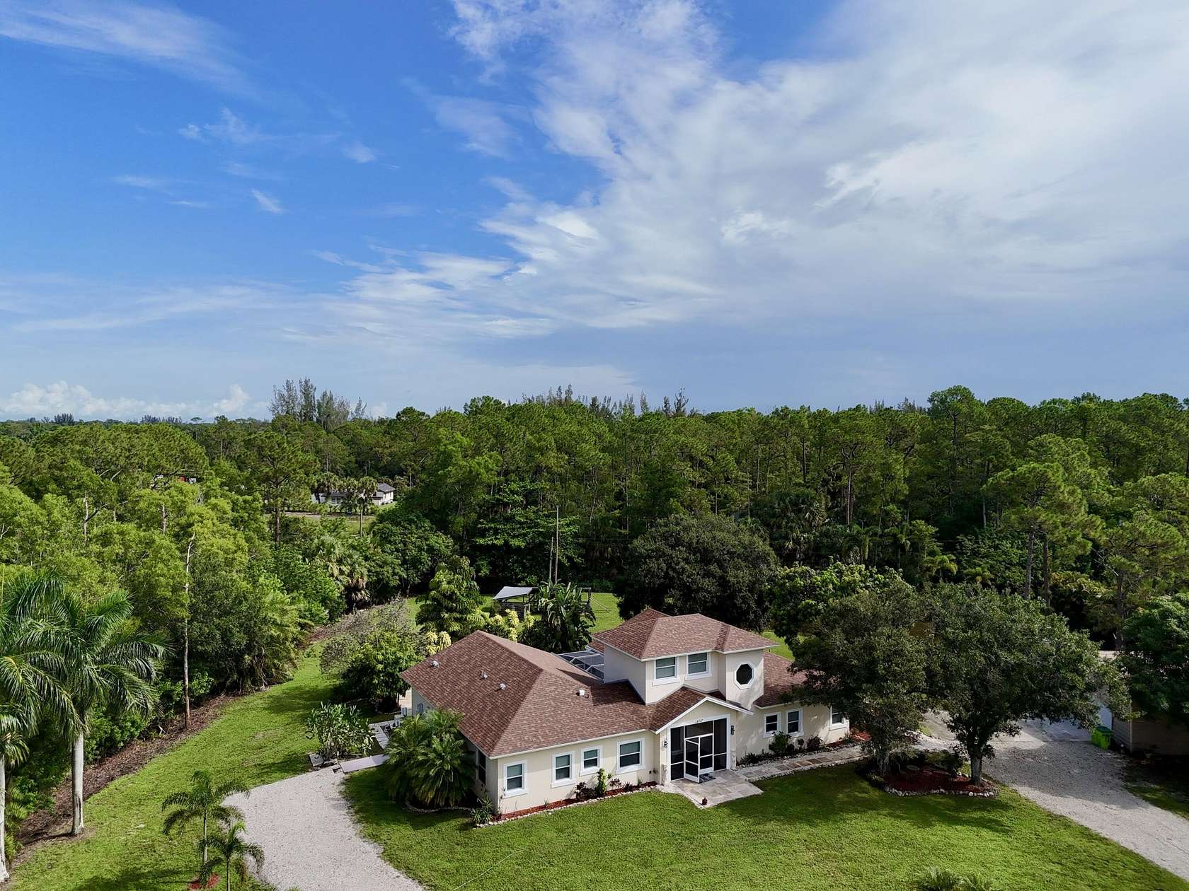 1.84 Acres of Land with Home for Sale in Loxahatchee Groves, Florida