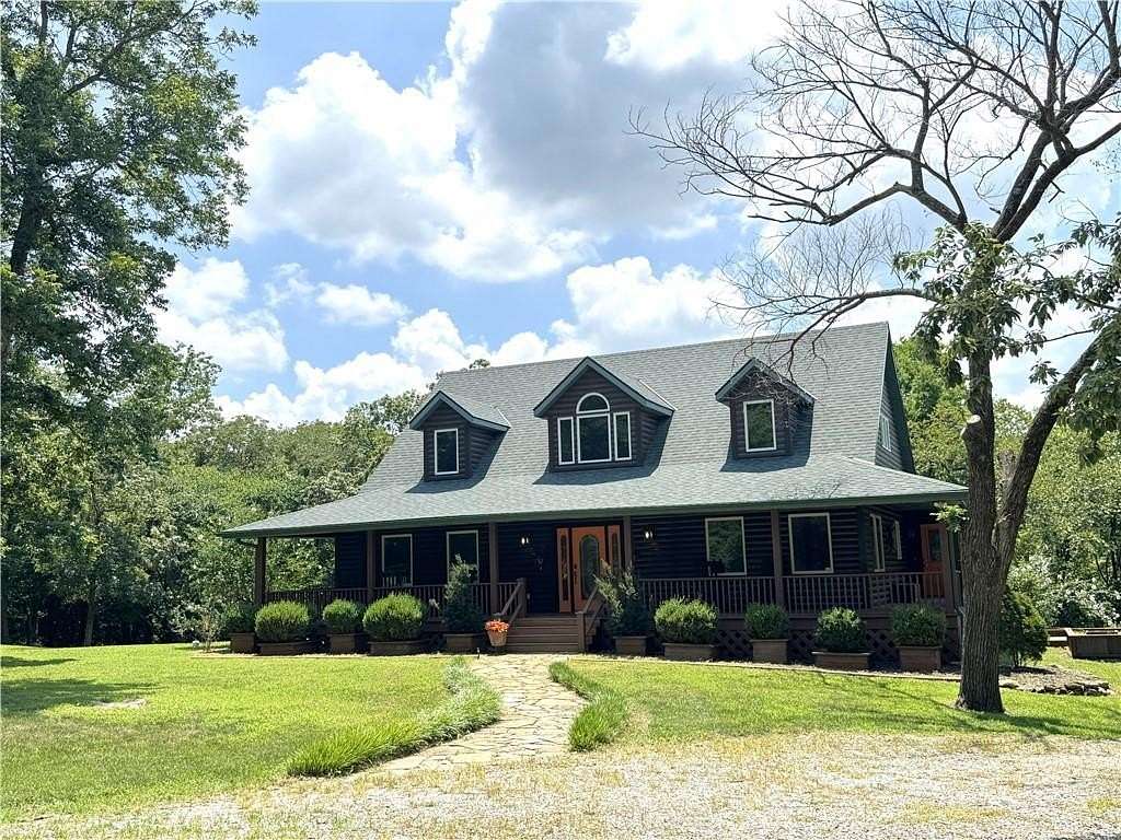 9 Acres of Land with Home for Sale in La Cygne, Kansas
