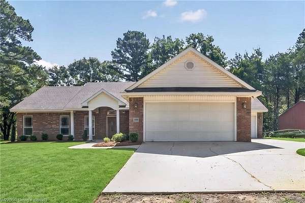 10.1 Acres of Land with Home for Auction in Van Buren, Arkansas