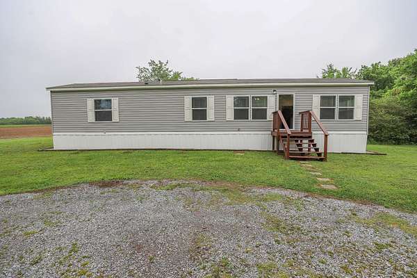 2.69 Acres of Land with Home for Sale in Almo, Kentucky