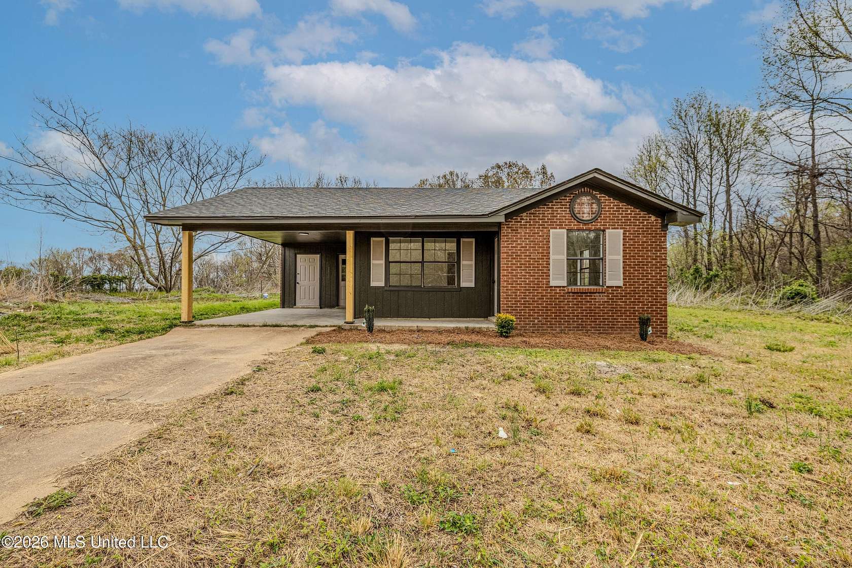 1.5 Acres of Land with Home for Sale in Coldwater, Mississippi