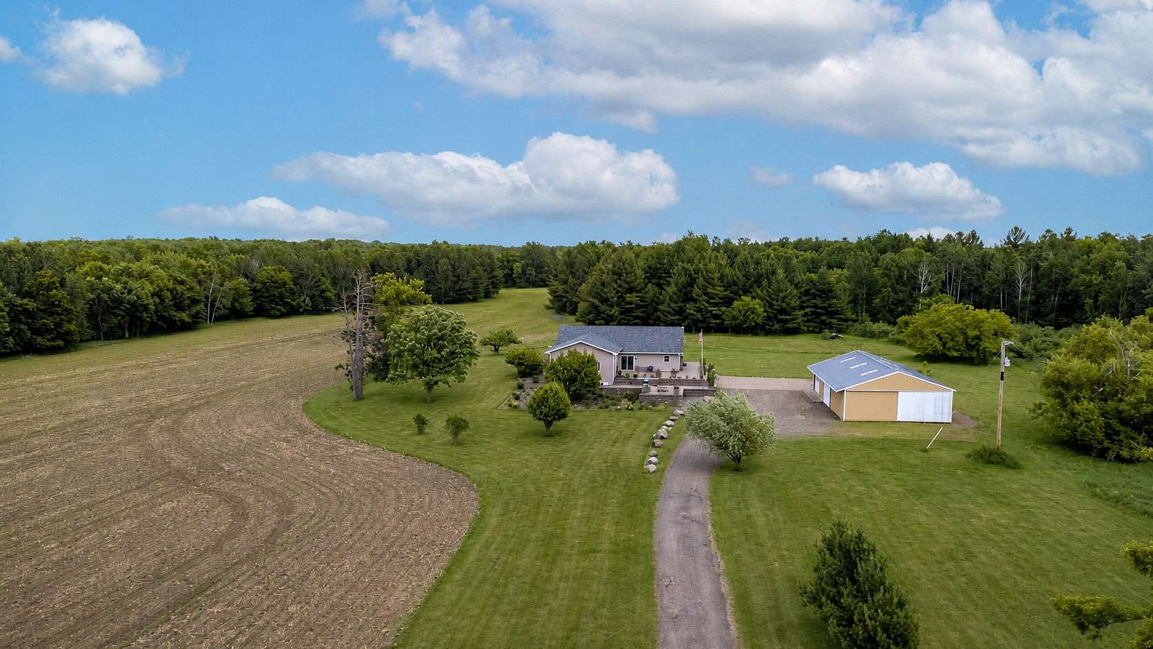 5 Acres of Land with Home for Sale in Braham, Minnesota