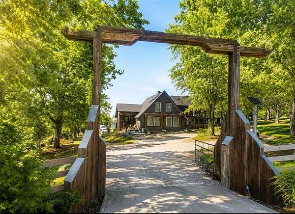 9.6 Acres of Land with Home for Sale in Grain Valley, Missouri
