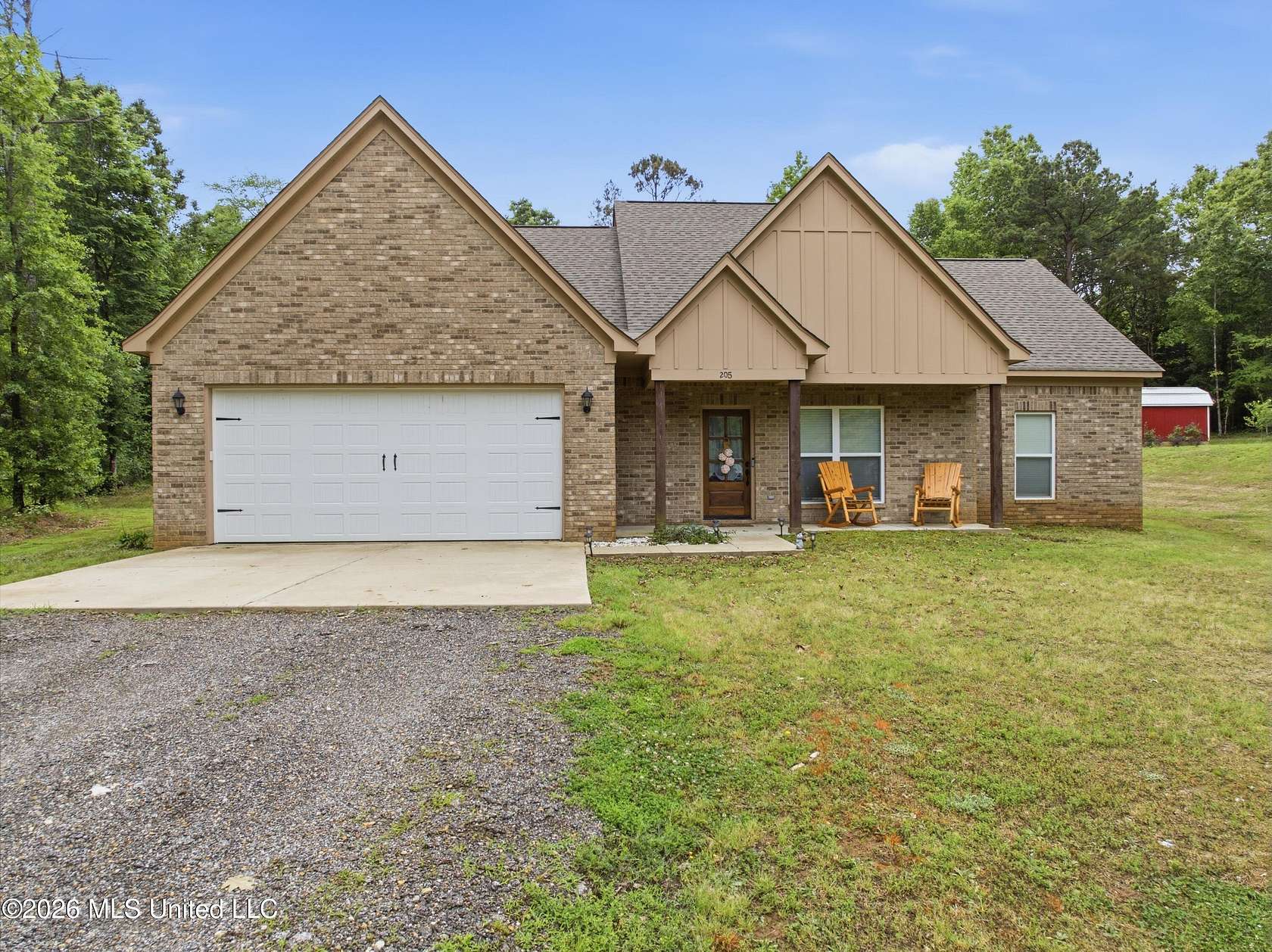 1.5 Acres of Land with Home for Sale in Coldwater, Mississippi