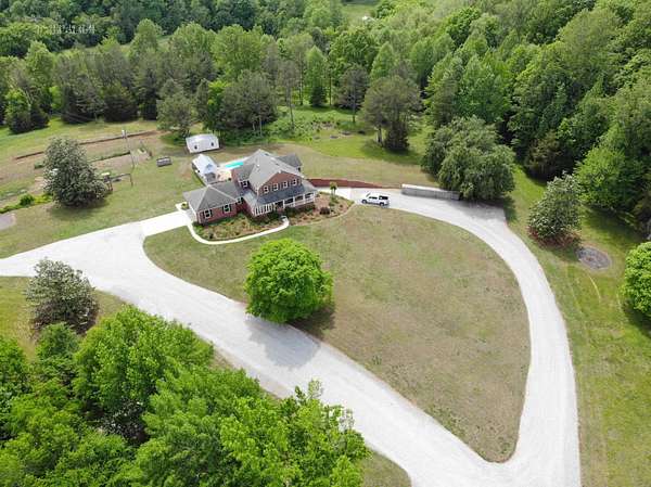 90.7 Acres of Land with Home for Sale in Florence, Alabama