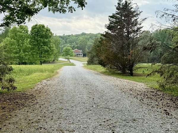 90.7 Acres of Land with Home for Sale in Florence, Alabama