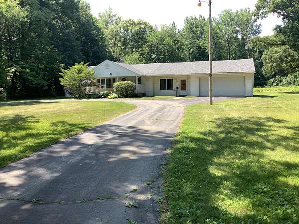 8.19 Acres of Land with Home for Sale in Belleville, Michigan