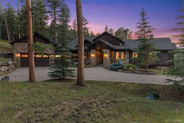 5.29 Acres of Land with Home for Sale in Evergreen, Colorado