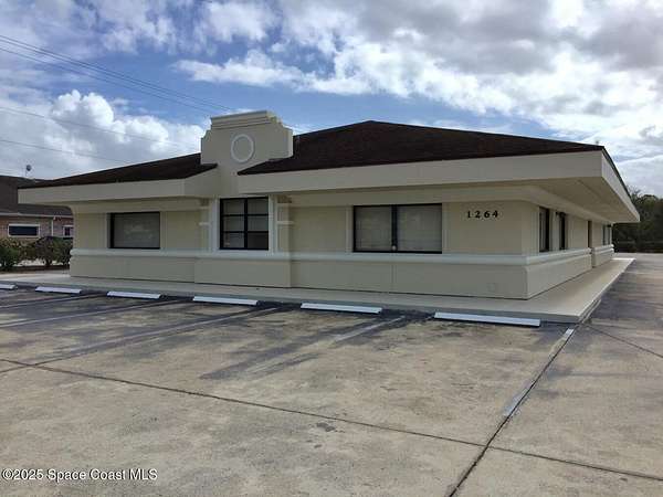 3.49 Acres of Improved Mixed-Use Land for Sale in Palm Bay, Florida