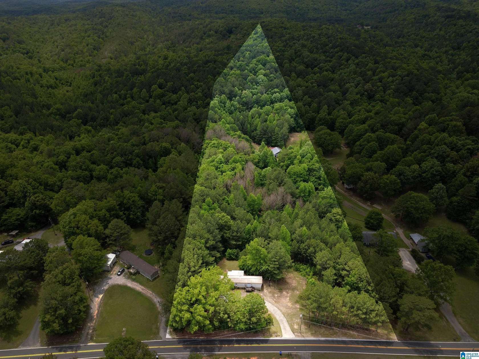 8.6 Acres of Land with Home for Sale in Pell City, Alabama