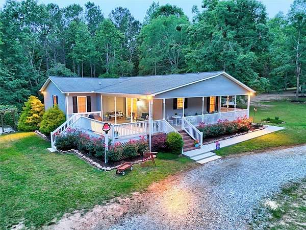 58.3 Acres of Land with Home for Sale in Laurens, South Carolina