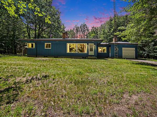 4 Acres of Land with Home for Sale in New Era, Michigan