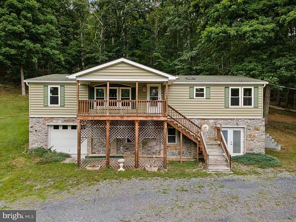 6.2 Acres of Land with Home for Sale in Paw Paw, West Virginia