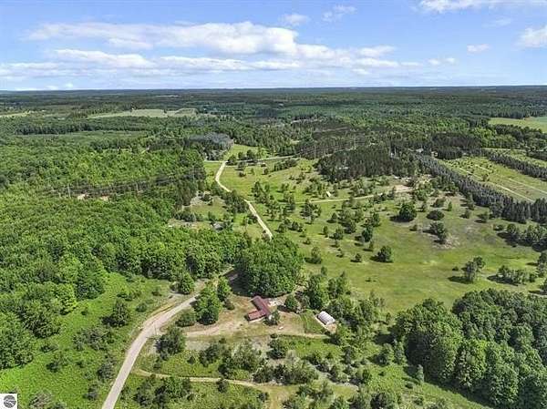 10 Acres of Recreational Land with Home for Sale in Mesick, Michigan