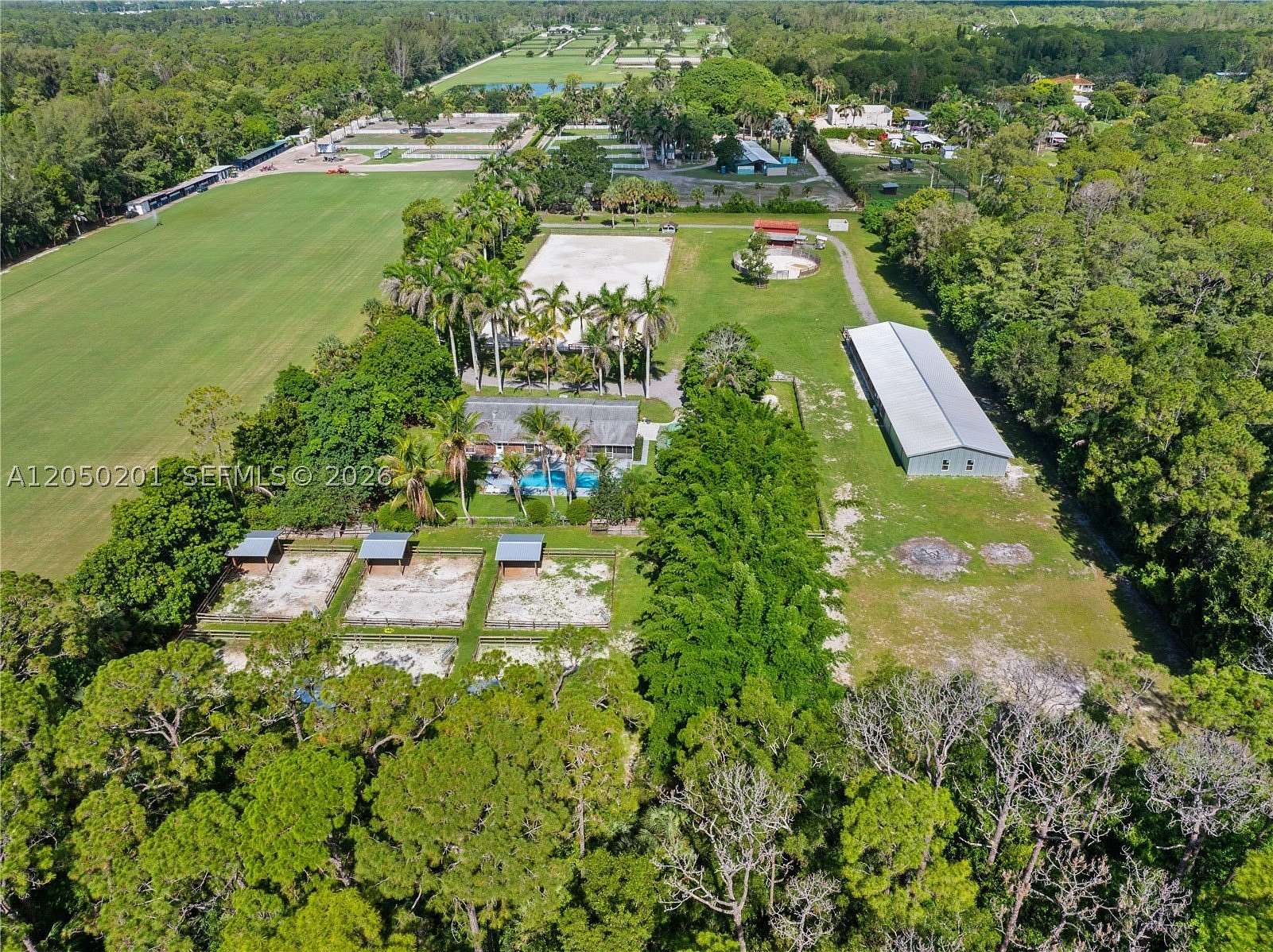 5 Acres of Land with Home for Sale in Loxahatchee Groves, Florida
