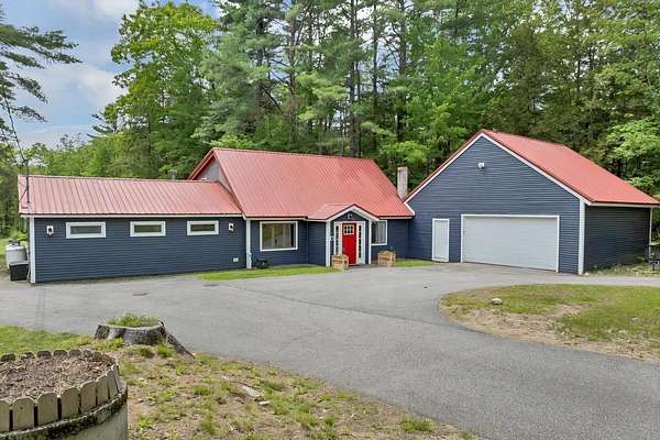 1.63 Acres of Land with Home for Sale in Belmont, New Hampshire