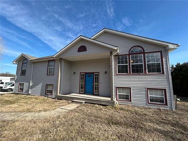 1.5 Acres of Land with Home for Sale in Lone Jack, Missouri