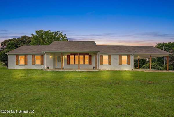 6.6 Acres of Land with Home for Sale in Coldwater, Mississippi