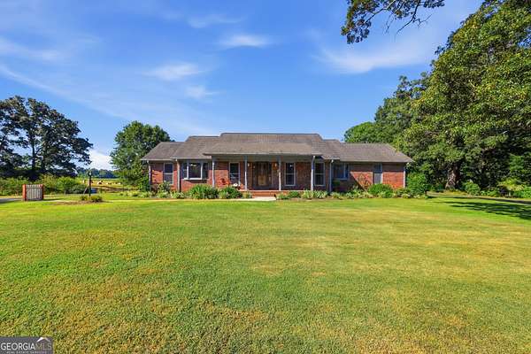 1.5 Acres of Land with Home for Sale in Carnesville, Georgia