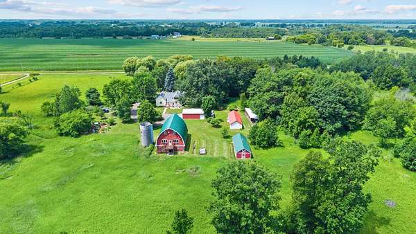 35.2 Acres of Agricultural Land with Home for Sale in Dalbo, Minnesota