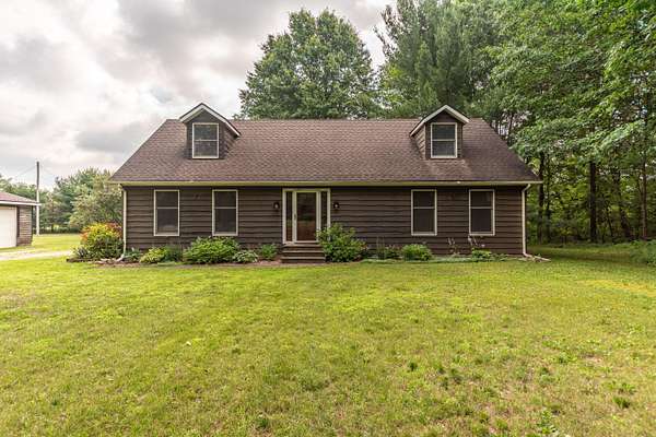 2 Acres of Land with Home for Sale in Grass Lake, Michigan