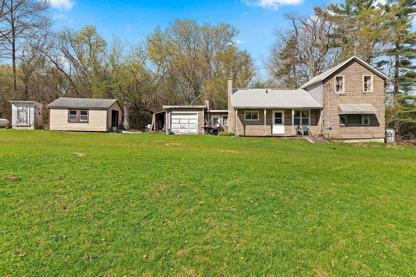 10 Acres of Recreational Land with Home for Sale in Wild Rose, Wisconsin