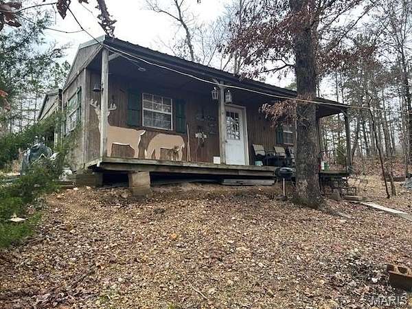 14.2 Acres of Recreational Land with Home for Sale in Annapolis, Missouri