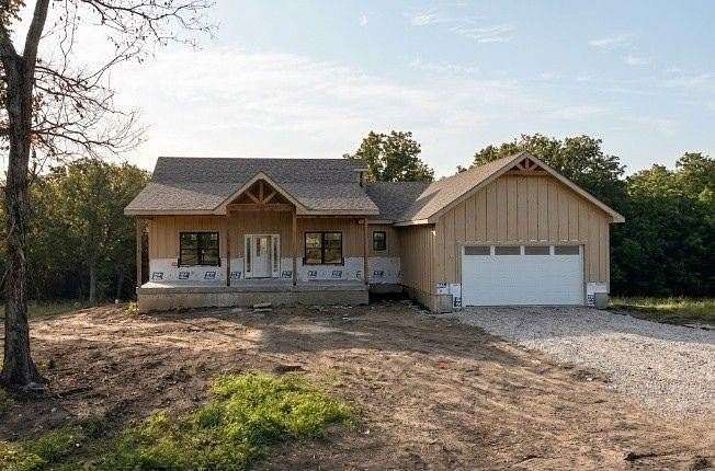 7.5 Acres of Land with Home for Sale in Holden, Missouri