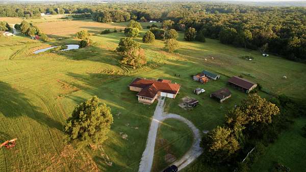 74.8 Acres of Land with Home for Sale in Neosho, Missouri