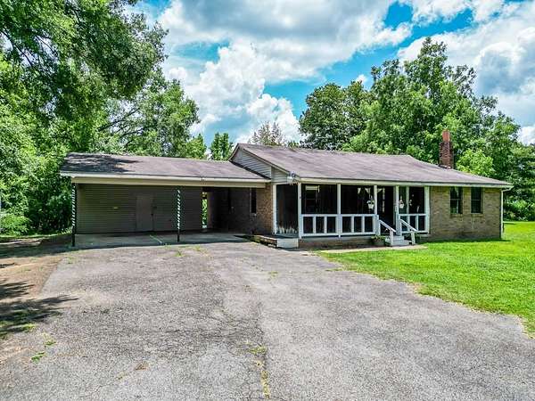 1.5 Acres of Land with Home for Sale in Water Valley, Mississippi