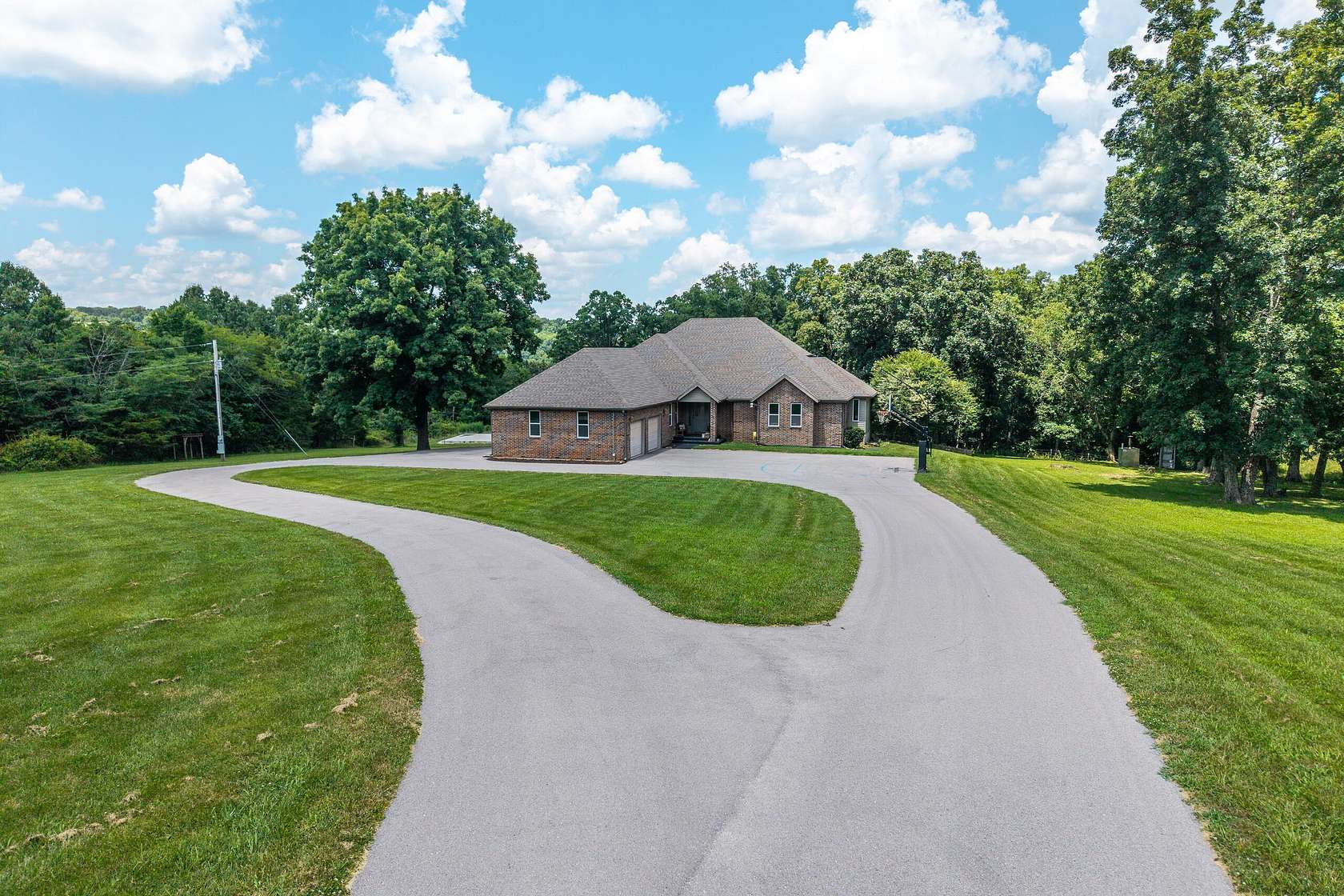 15 Acres of Land with Home for Sale in Hartville, Missouri
