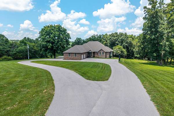 15 Acres of Land with Home for Sale in Hartville, Missouri