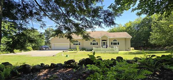 2.5 Acres of Land with Home for Sale in Gilford, New Hampshire